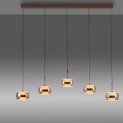 Moderne 4-flammige Pendelleuchte mit rauchgrauen Glas-Schirmen und kupferfarbenen Details an einer länglichen Deckenleiste, warm leuchtend, Frontalansicht