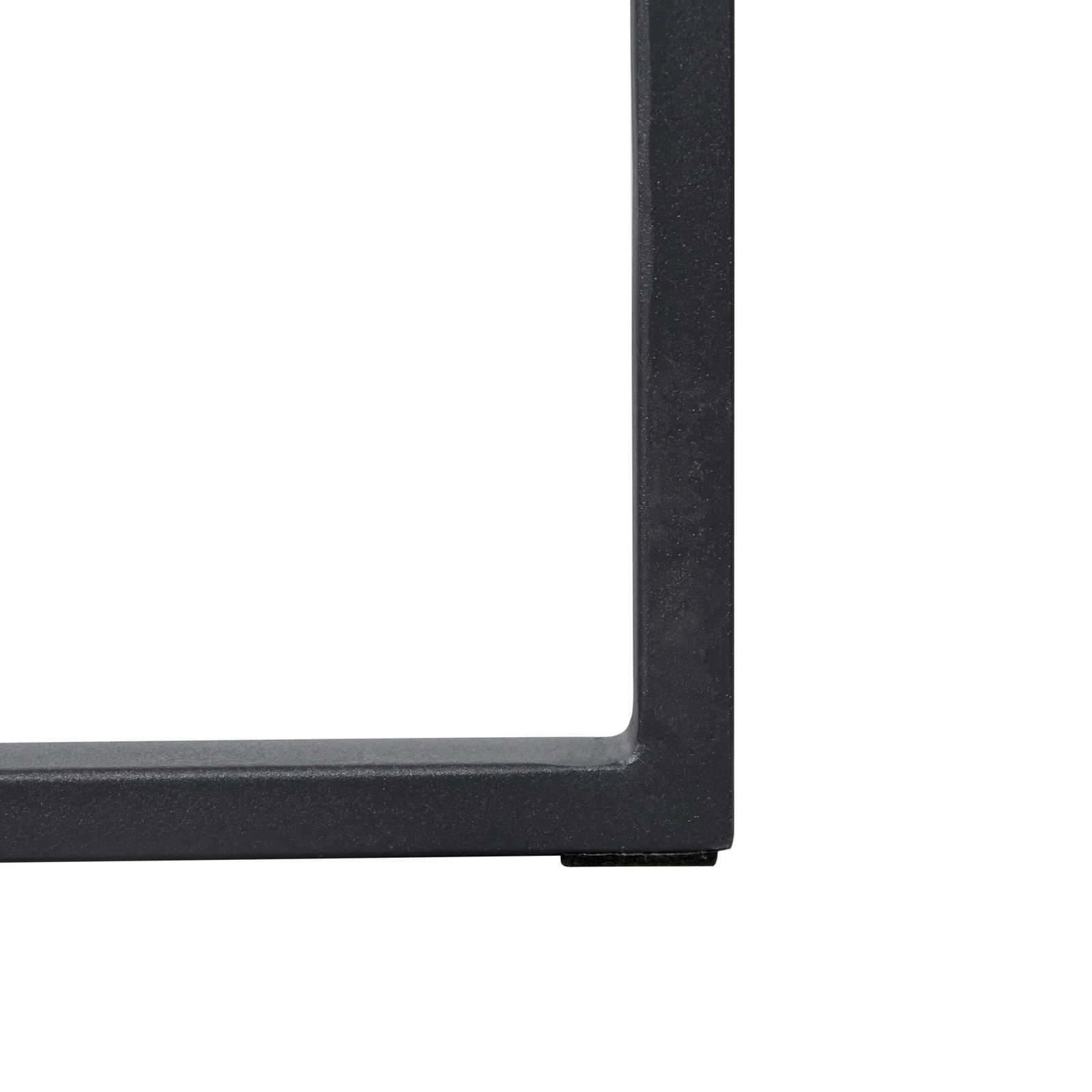 Nahaufnahme eines schwarzen Metallrahmens eines Konsolentisches, seitliche Perspektive