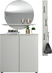 Modernes weißes Sideboard mit zwei Türen, darüber runder Wandspiegel und Ablage mit Deko und Pflanzen; Ansicht von vorne.