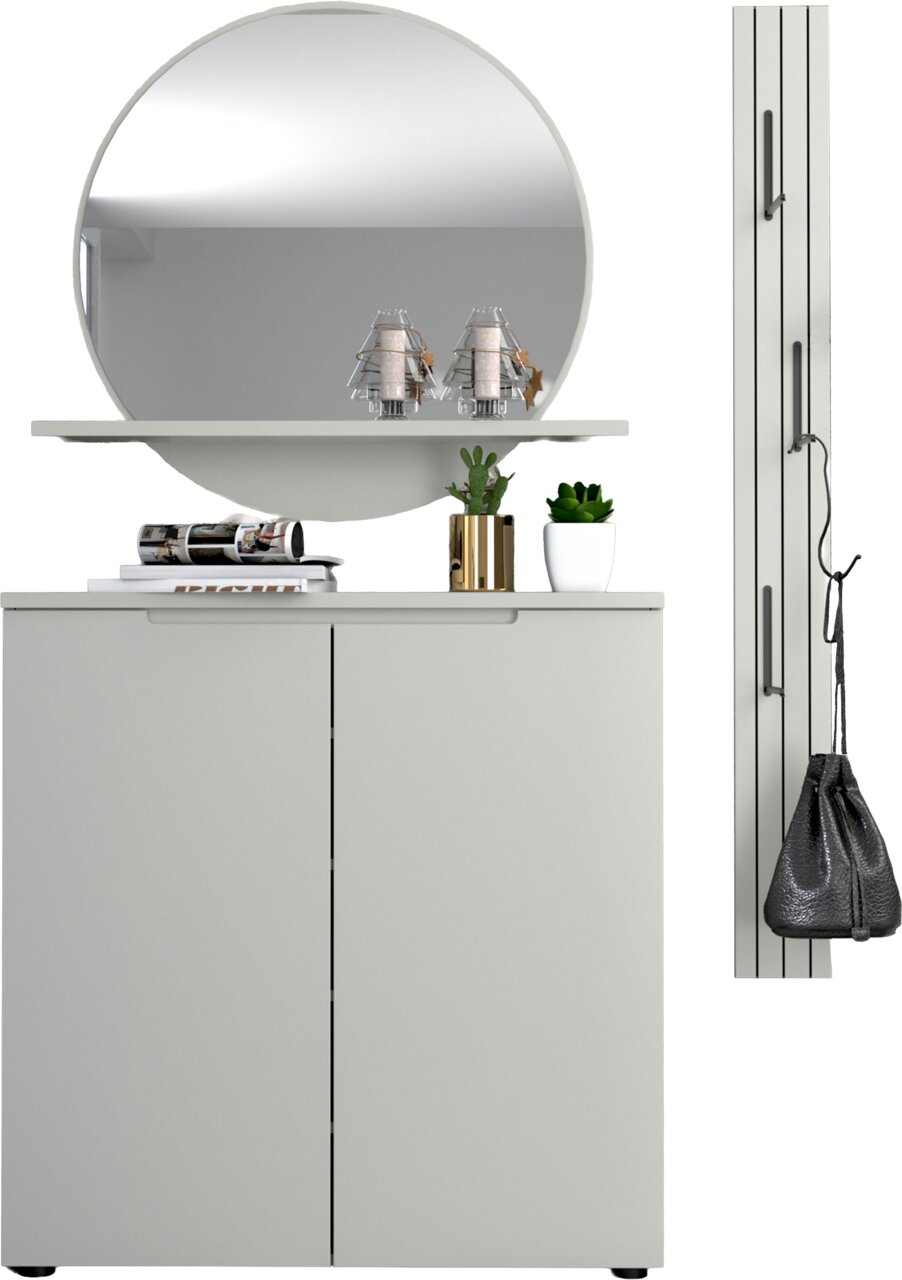 Modernes weißes Sideboard mit zwei Türen, darüber runder Wandspiegel und Ablage mit Deko und Pflanzen; Ansicht von vorne.