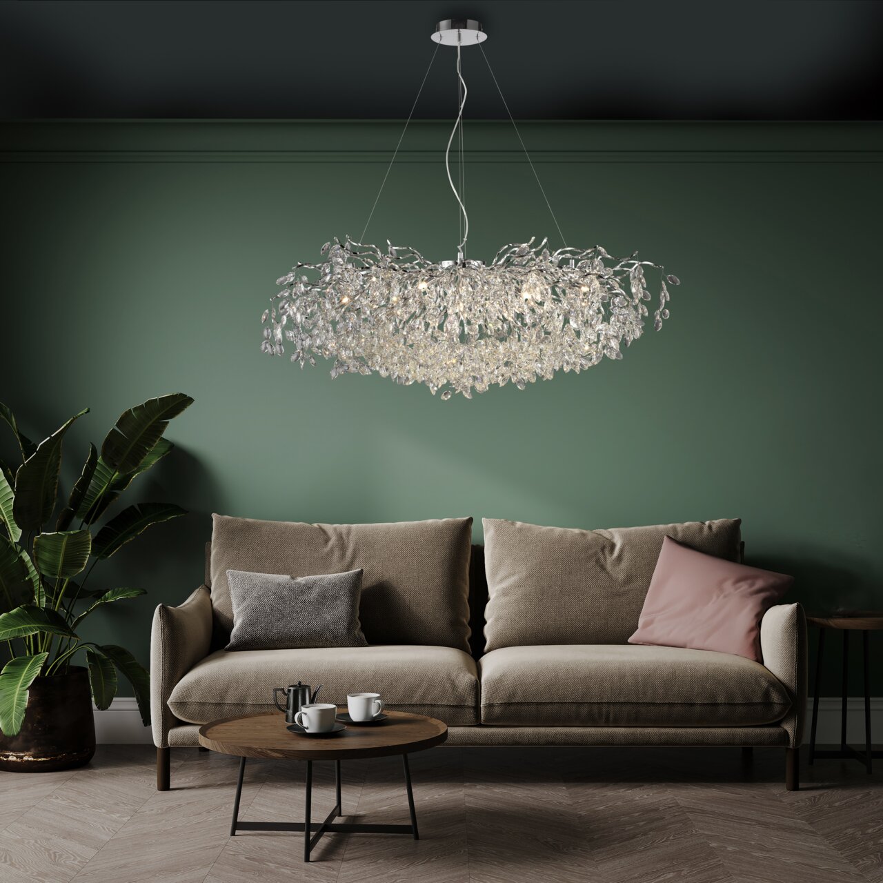 Paul Neuhaus Kroonluchter RICICLE RICICLE Moderne kroonluchter RICICLE in een stijlvolle woonkamer, gezien vanaf de voorkant, met een elegante bank en een groene muur op de achtergrond.