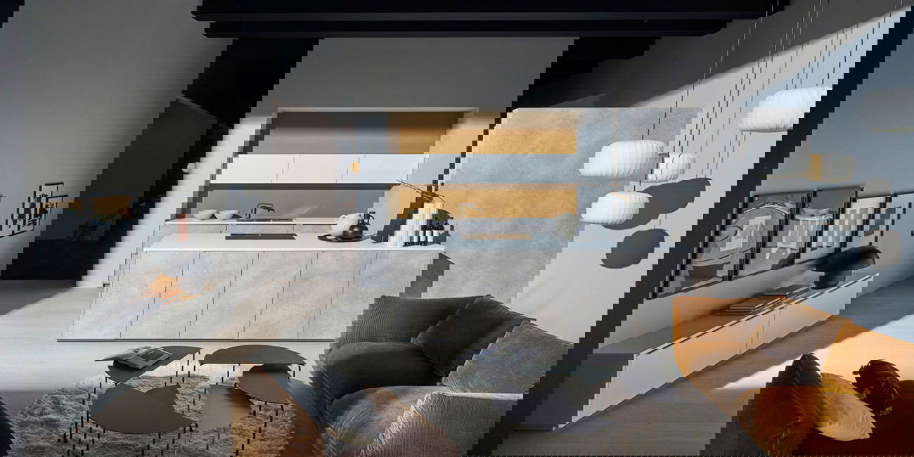 Eine moderne Küche in hellgrau mit einer weißer Arbeitsplatte.