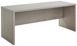 Moderner Schreibtisch in Betonoptik, seitliche Perspektive