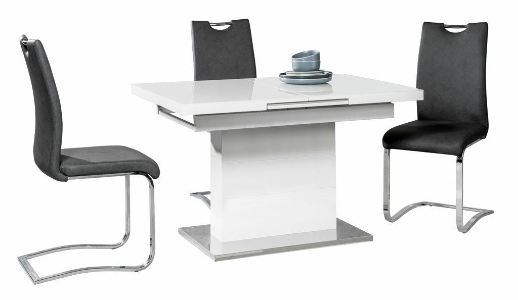 Esszimmer-Set mit modernem weißen Tisch und zwei schwarzen Freischwinger-Stühlen, seitliche Perspektive