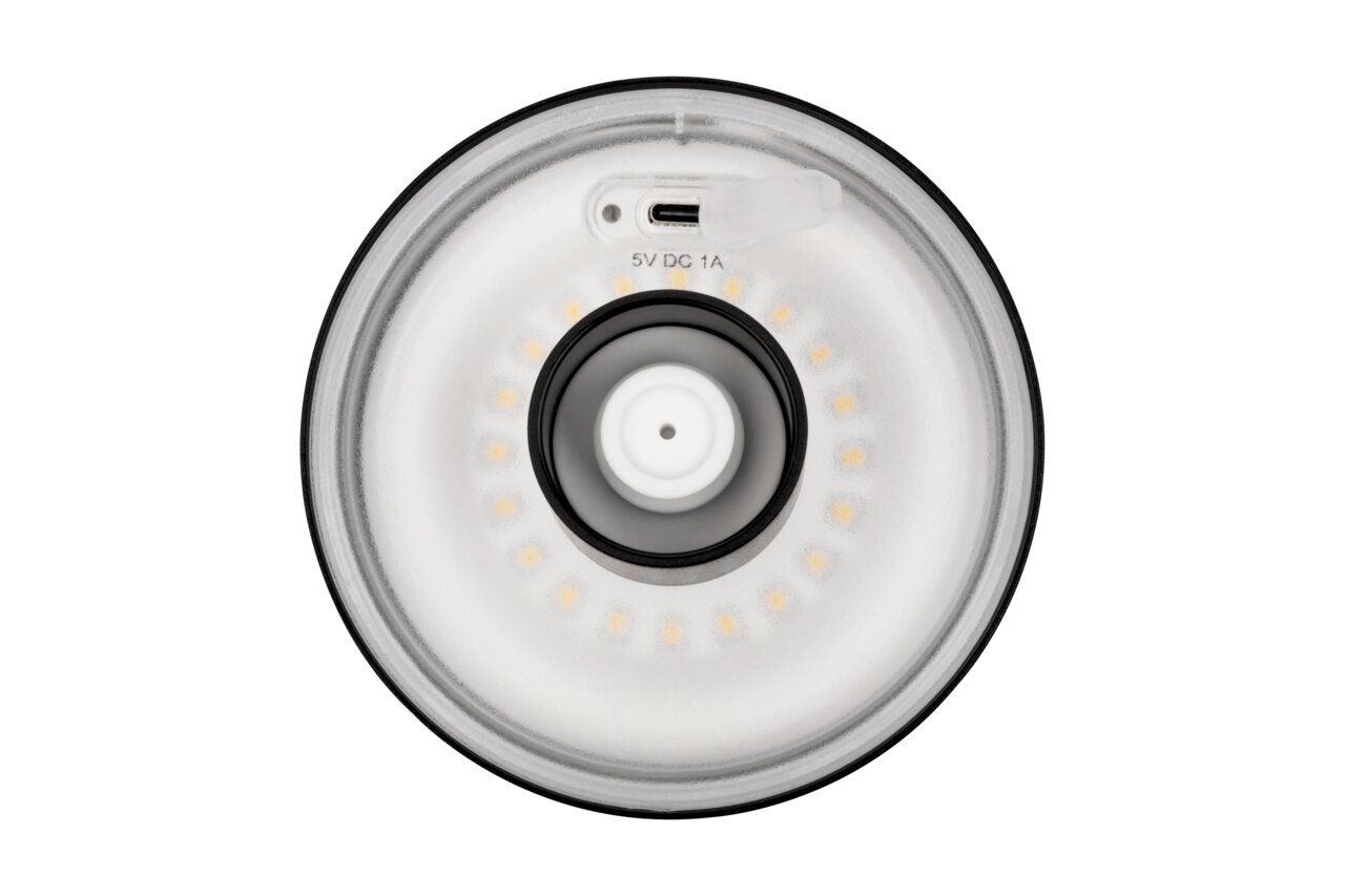 Draufsicht auf die Unterseite einer runden Akku-Tischleuchte mit USB-C-Anschluss und LED-Lichtern.