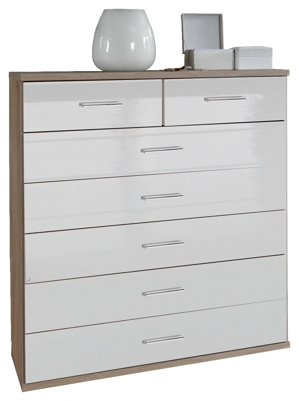 XORA Schubkastenkommode MALTA Weiße Schubkastenkommode mit mehreren Schubladen, dekoriert mit einer Vase und Schmuckkästchen, aus frontaler Perspektive.