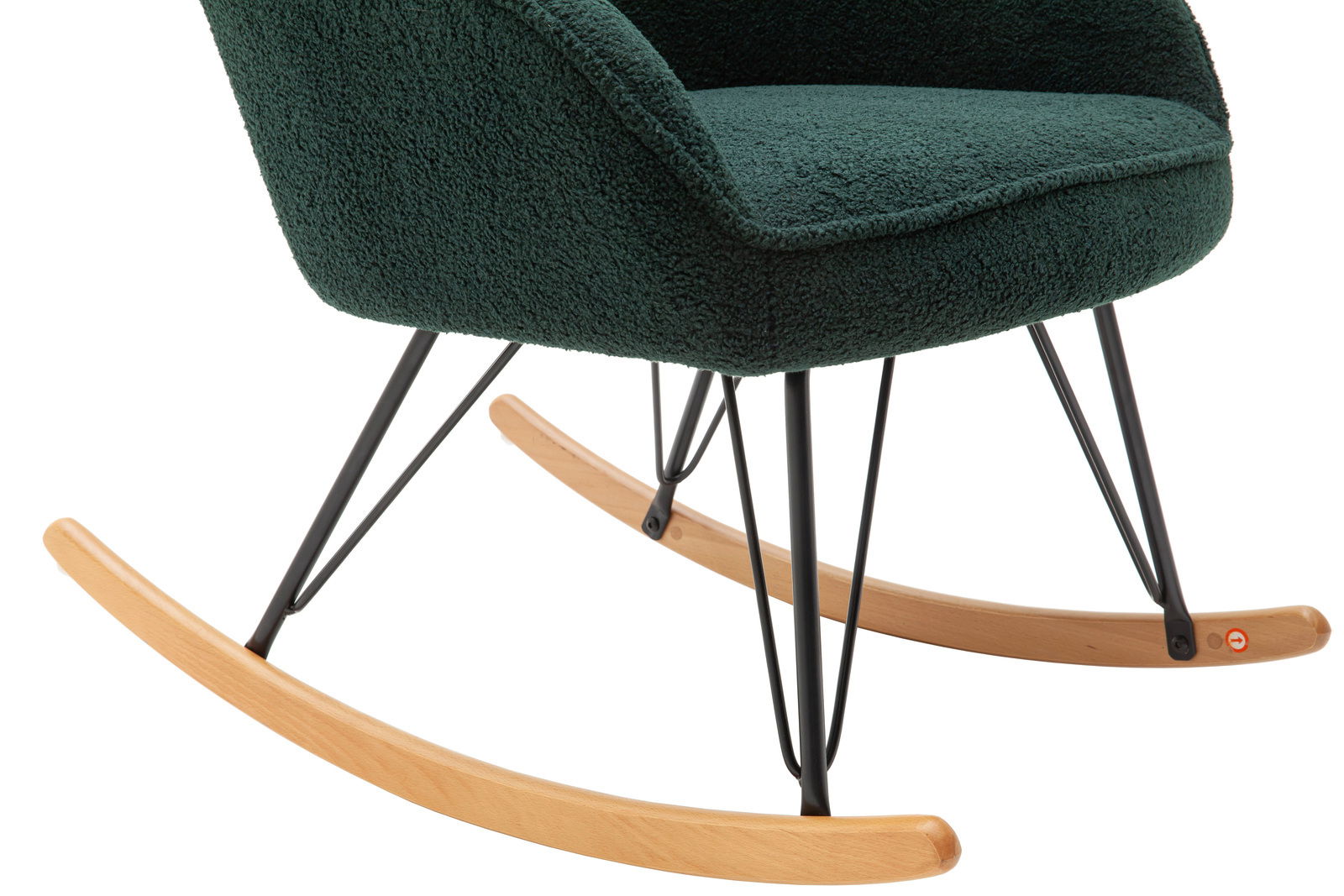 Nahaufnahme eines modernen Schaukelstuhls mit grünem Stoffbezug und Holzbeinen, seitliche Perspektive