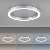Moderne runde Deckenleuchte aus Metall mit LED-Beleuchtung, von unten betrachtet.