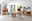 Linea Natura Sideboard GEORGIA Esszimmer mit modernem Sideboard aus Holz, grauen Stühlen und Esstisch, seitliche Perspektive