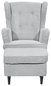 Grauer Sessel mit geripptem Stoffbezug, frontal fotografiert, mit schwarzen Beinen.