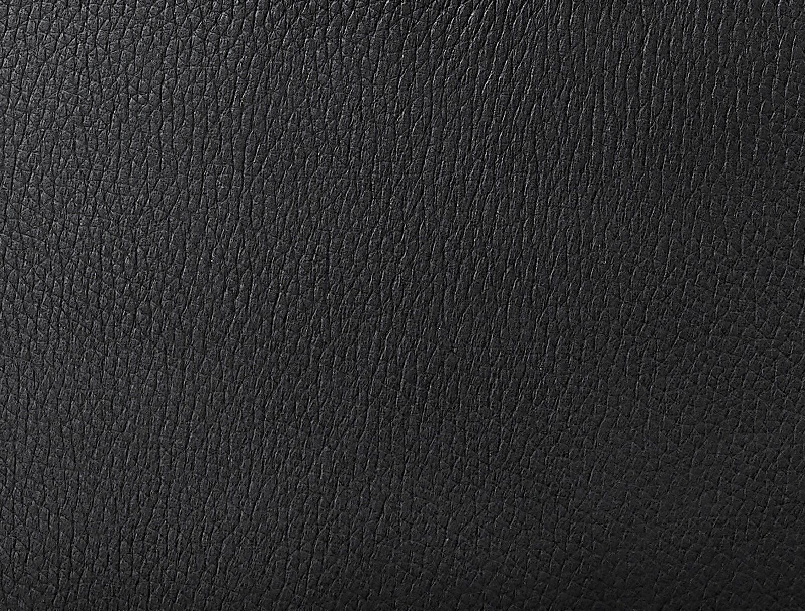 Nahaufnahme von schwarzem Lederbezug, Textur sichtbar