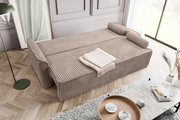 Schlafsofa in beige mit geripptem Stoff, von oben fotografiert, mit zwei Kissen und einer gefalteten Decke.