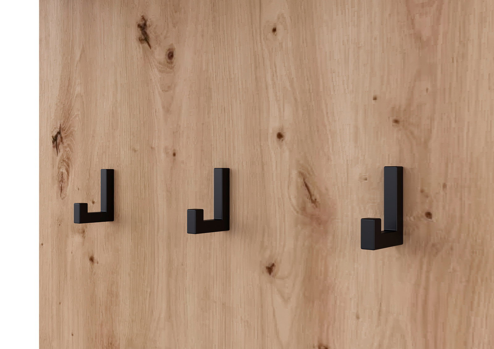 Nahaufnahme einer Holzwand mit drei schwarzen Haken in moderner, minimalistischer Gestaltung.