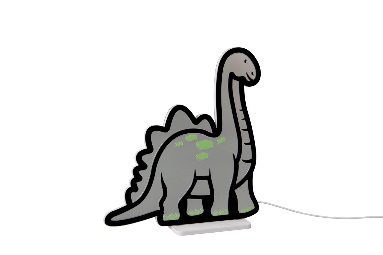 Graue Dinosaurier-Nachtlampe in Cartoon-Form mit grünen Punkten auf weißem Sockel, seitliche Vorderansicht vor weißem Hintergrund mit sichtbarem Kabel