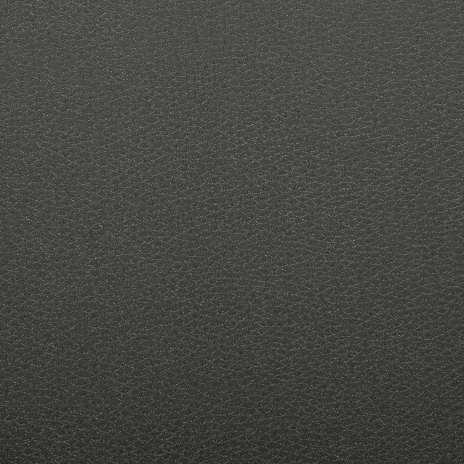Nahaufnahme in Draufsicht: dunkelgraue, fein genarbte Leder- oder Kunstlederoberfläche mit gleichmäßiger Struktur