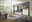 Wohnzimmer mit moderner Wohnwand in heller Holzoptik, bestehend aus Highboard, Hängeelement, Lowboard und Wandboard, mit dekorativer Beleuchtung und gemütlicher Atmosphäre, seitliche Perspektive.