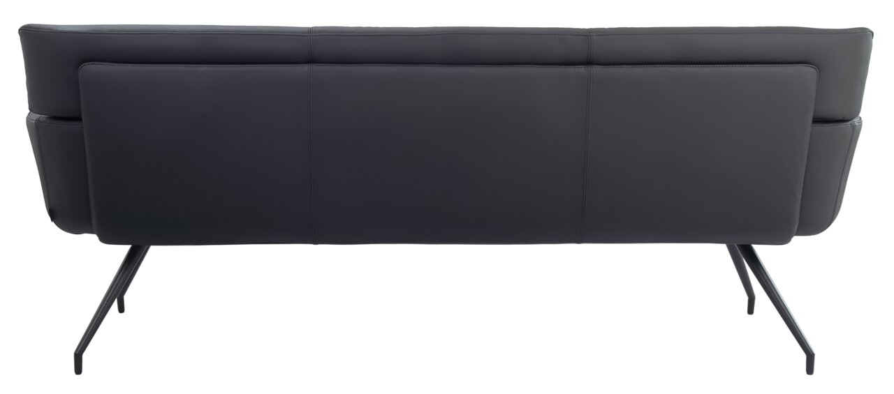Achterkant van een moderne zwarte bank met slanke metalen poten.
