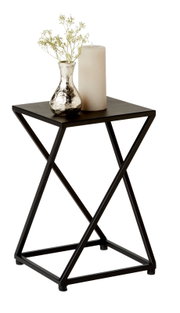 Moderner Beistelltisch mit schwarzem Metallgestell, darauf eine silberne Vase mit weißen Blumen und eine große Kerze, seitliche Perspektive.