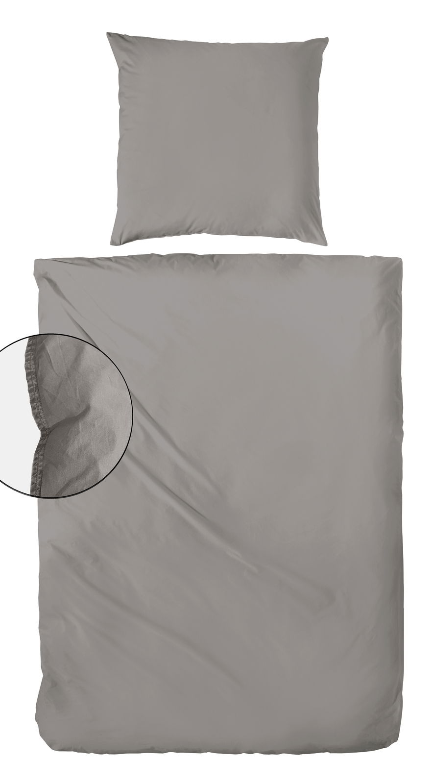 Graue Bettwäsche-Set bestehend aus einem Kissenbezug und einem Bettdeckenbezug in Stone-Washed-Optik, von oben betrachtet.