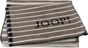 Gefaltete JOOP! Wohndecke/Decke in Taupe mit weißen Querstreifen und dunkler Ziernaht am Rand, Produktansicht leicht schräg von oben