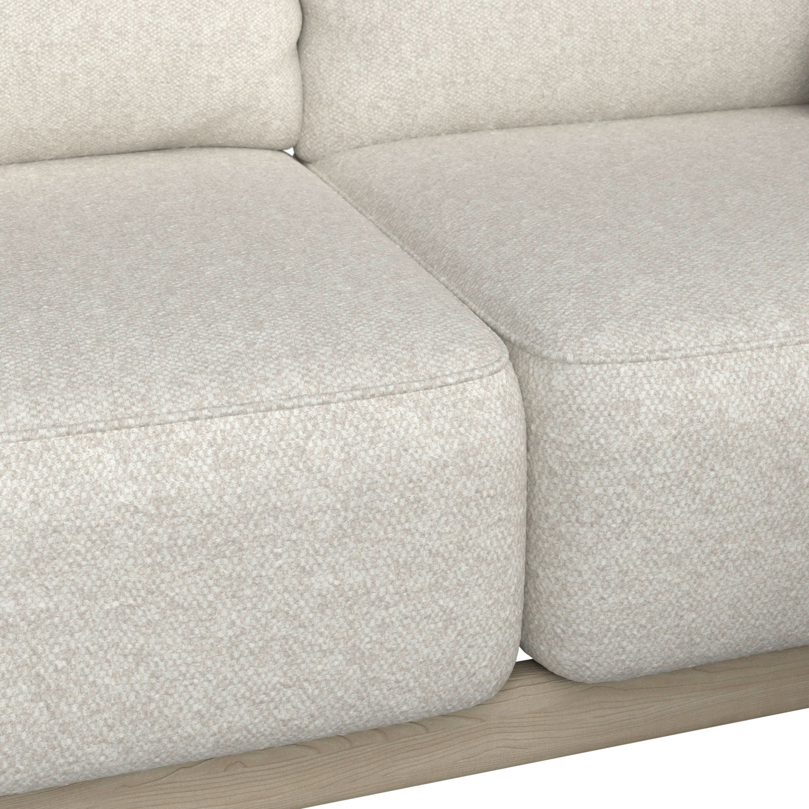 Nahaufnahme einer Loungeeckgarnitur in hellem Stoff, seitliche Perspektive