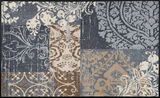 Fußmatte Armonia grey mit floralem und geometrischem Muster in verschiedenen Grautönen und Braun, Draufsicht.