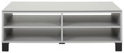 Moderner Couchtisch mit vier offenen Fächern, frontal betrachtet.