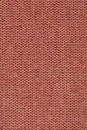 Nahaufnahme eines roten Stoffmusters mit grober Webstruktur.