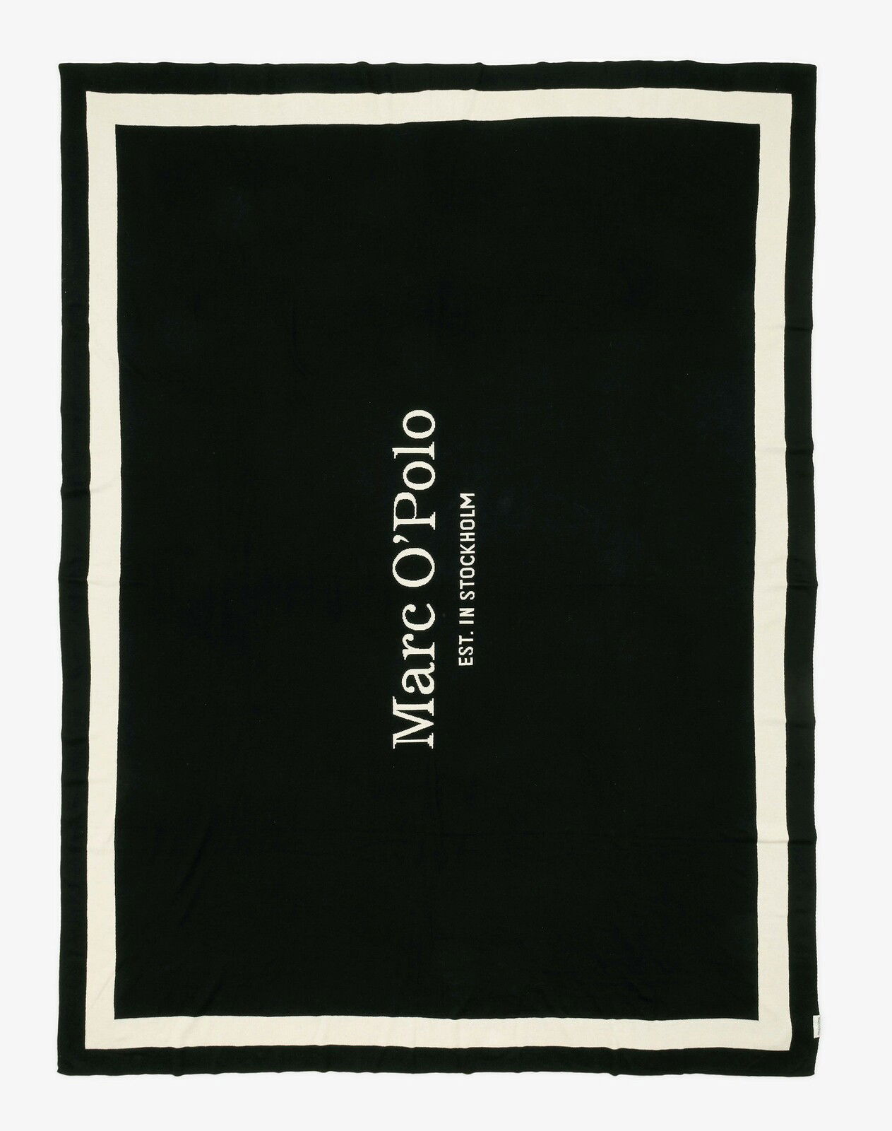 Schwarze Marc O'Polo Decke mit weißem Rand und vertikalem Logo, Draufsicht