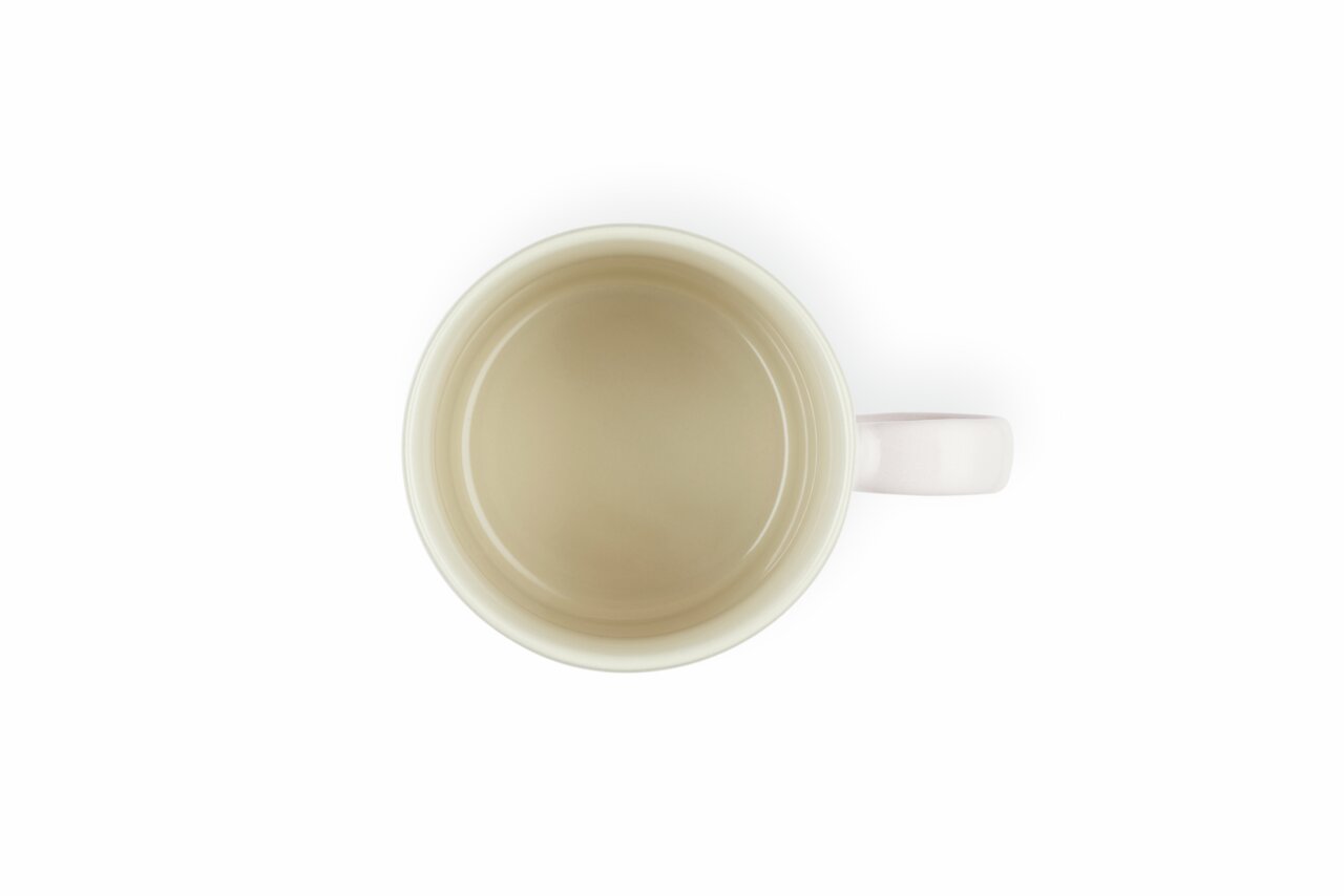 Ansicht von oben auf einen Becher mit rosa Henkel