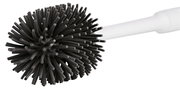 Nahaufnahme einer Toilettenbürste mit schwarzem, flexiblem Bürstenkopf und weißem Griff, seitliche Perspektive