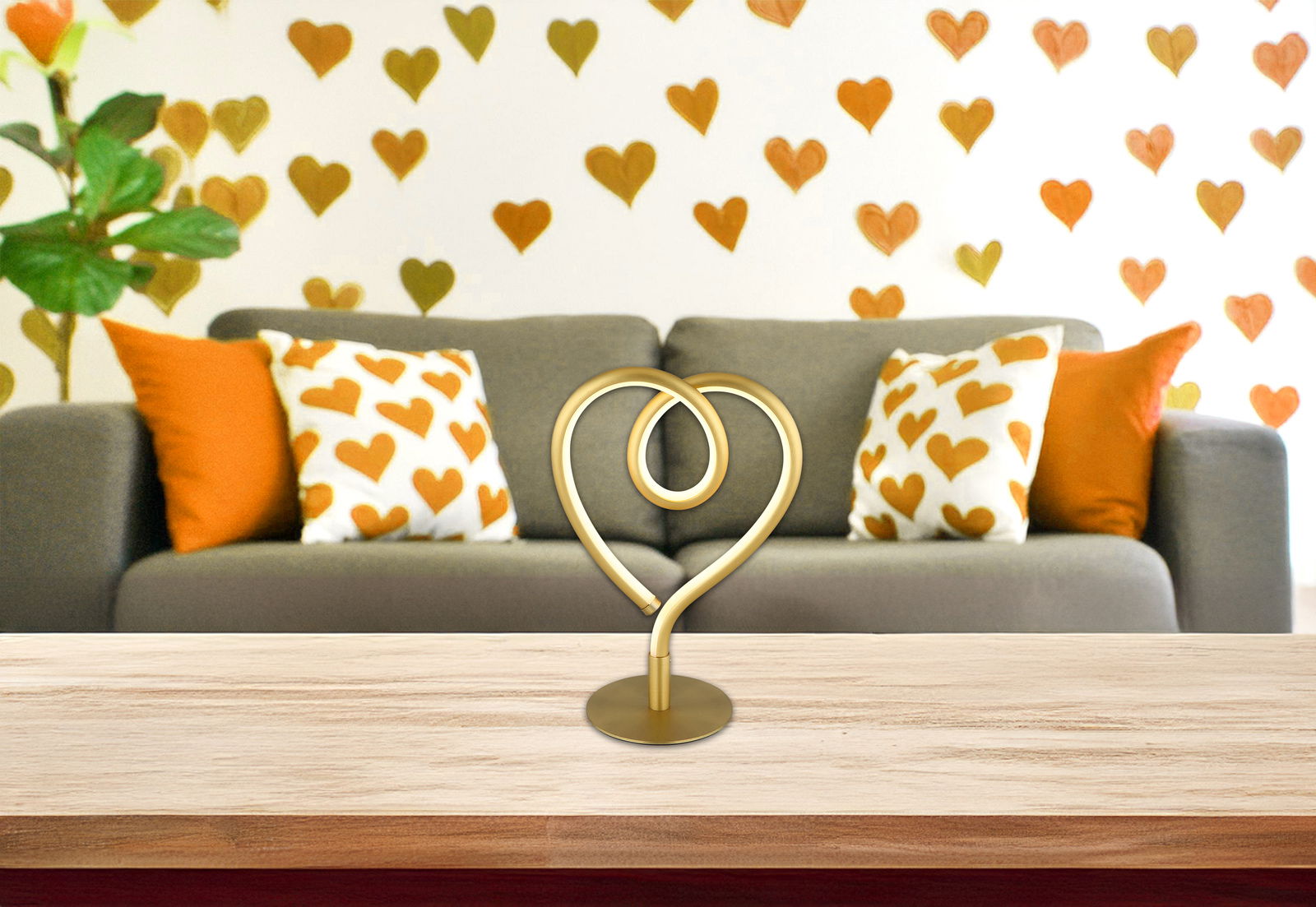 Globo Lighting LED-Tischleuchte AMORE LED-Tischleuchte in Herzform auf einem Tisch, im Hintergrund ein Sofa mit herzgemusterten Kissen, Frontalansicht