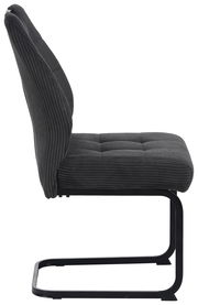 Seitenansicht eines modernen Schwingstuhls mit schwarzem, geripptem Stoffbezug und schwarzem Metallgestell.