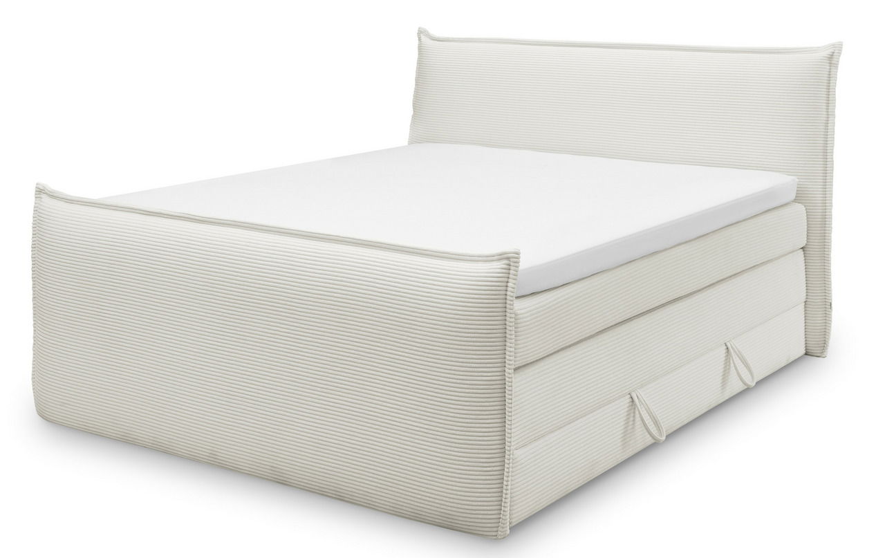 Boxspringbett in cremeweißer Farbe, seitliche Perspektive