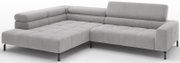 Lichtgrijze ribstof hoekbank met chaise longue links, gecapitonneerde zittingen en zwarte poten, getoond in schuin vooraanzicht