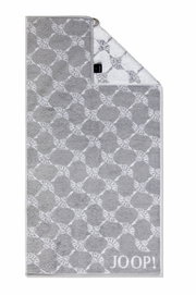 Graues Handtuch mit geometrischem Muster und JOOP!-Logo, von oben fotografiert.