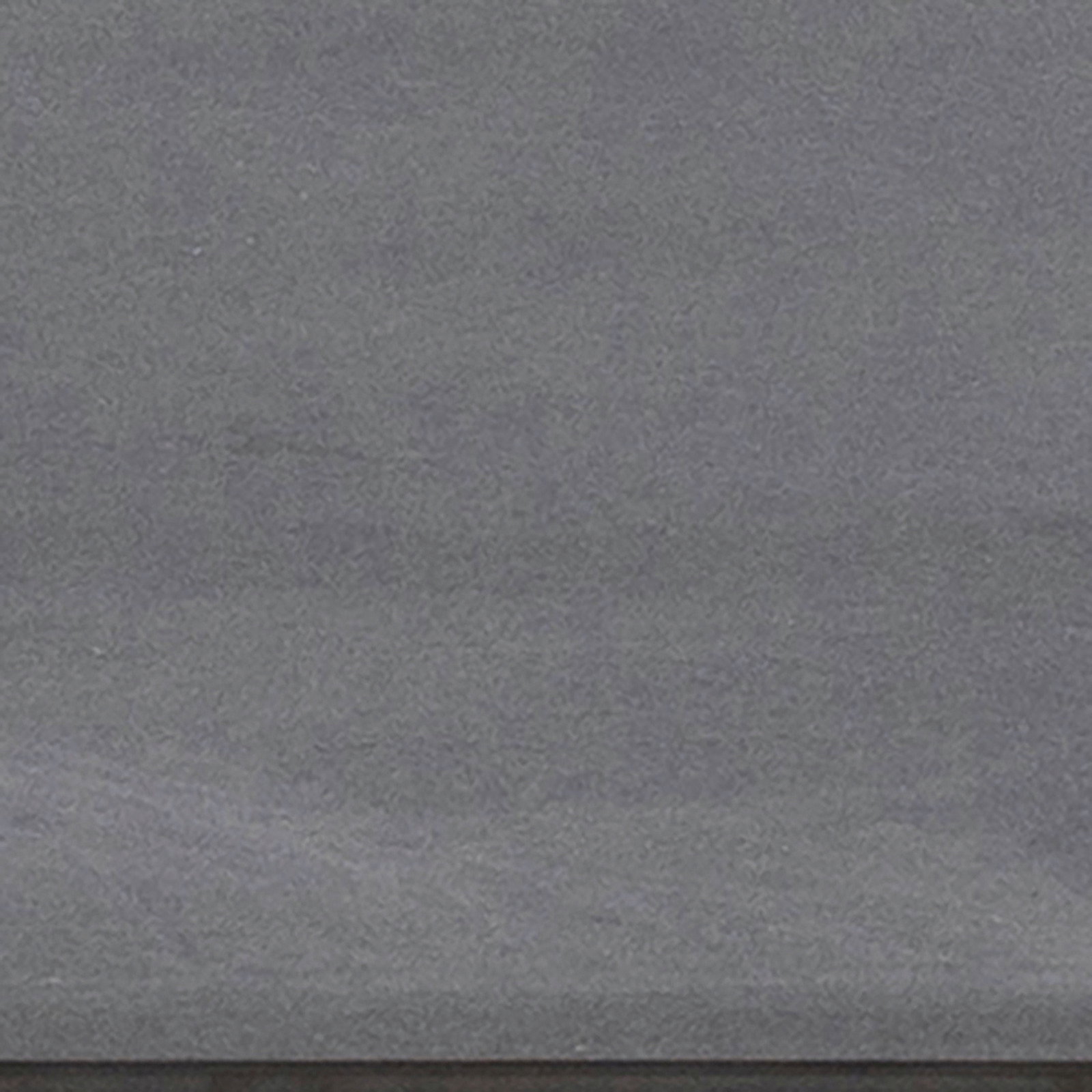 Nahaufnahme der Tischoberfläche eines Esstisches in grauer Farbe