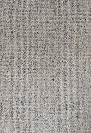 Nahaufnahme eines beige-gemusterten Stoffes, möglicherweise Polsterung für den Armlehnstuhl Dieter Knoll Armlehnstuhl PABLO.