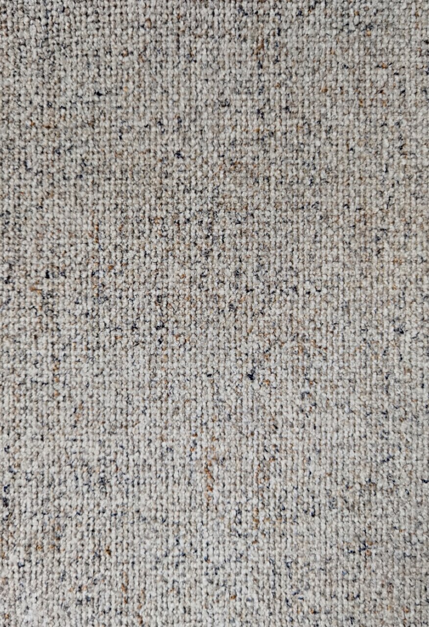 Nahaufnahme eines beige-gemusterten Stoffes, möglicherweise Polsterung für den Armlehnstuhl Dieter Knoll Armlehnstuhl PABLO.