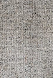 Nahaufnahme eines beige-gemusterten Stoffes, möglicherweise Polsterung für den Armlehnstuhl Dieter Knoll Armlehnstuhl PABLO.