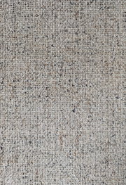 Nahaufnahme eines beige-gemusterten Stoffes, möglicherweise Polsterung für den Armlehnstuhl Dieter Knoll Armlehnstuhl PABLO.