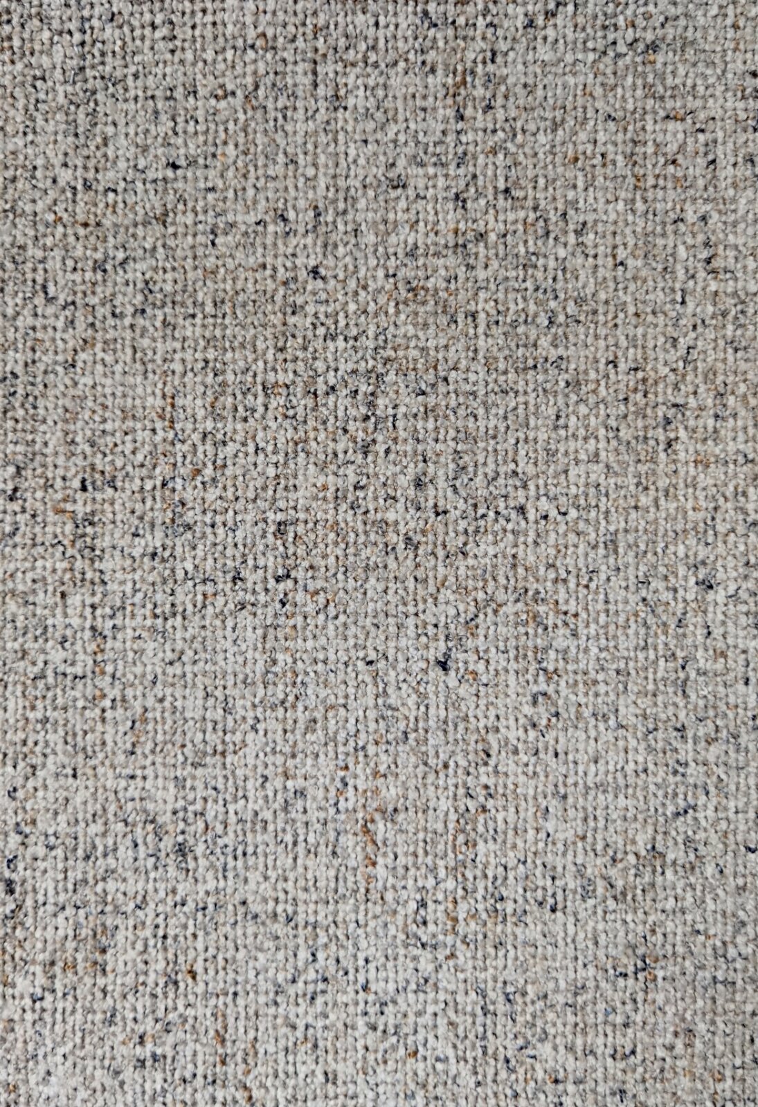 Dieter Knoll Fauteuil PABLO Close-up van een beige stof met patroon, mogelijk de bekleding van de Dieter Knoll-fauteuil PABLO.