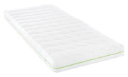 Weiße Jugendmatratze 140x200 cm mit grünem Reißverschluss, schräg von der Seite fotografiert.