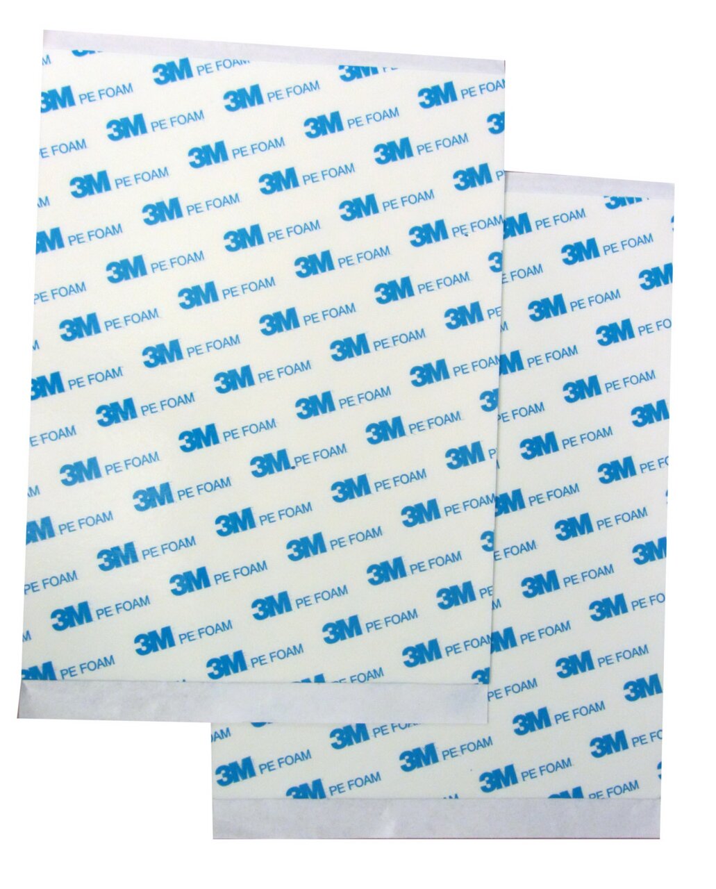 Zwei weiße 3M PE Foam Pads mit blauer Aufschrift, aus der Vogelperspektive fotografiert.