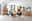 Esszimmer mit modernem Highboard aus Holz, umgeben von schwarzen Stühlen und einem Holztisch, seitliche Perspektive