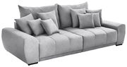 Großes, graues Big-Sofa mit mehreren Kissen, seitliche Perspektive