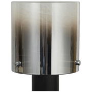 Moderne Tischleuchte mit zylindrischem, rauchgrauem Glasschirm, frontal betrachtet.