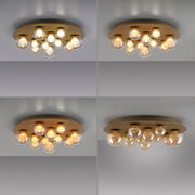 LED-Deckenleuchte mit mehreren kugelförmigen Glühbirnen, von unten und seitlich betrachtet.