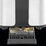 Nahaufnahme eines Toasters mit herausziehbarer Krümelschublade, Ansicht von unten.