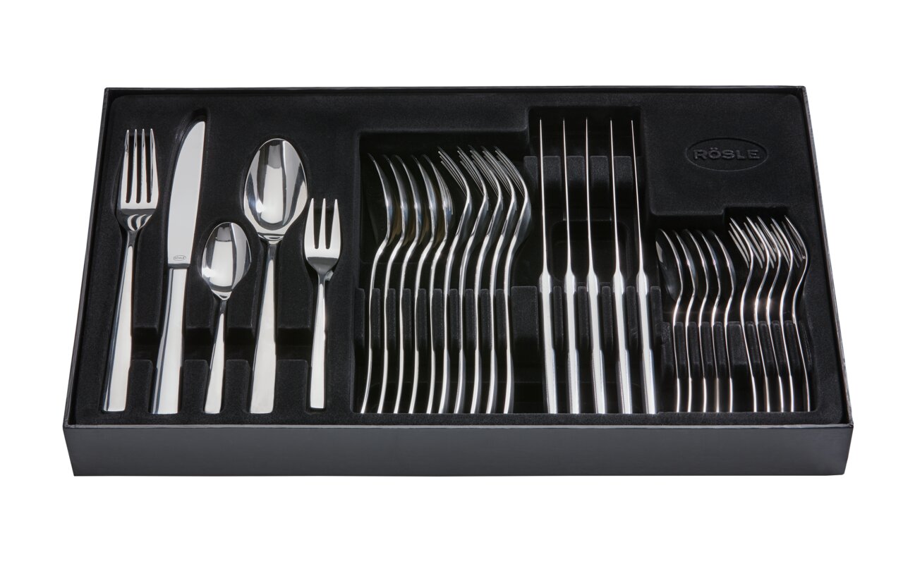 Elegantes 30-teiliges Besteckset in schwarzer Box, von oben fotografiert.